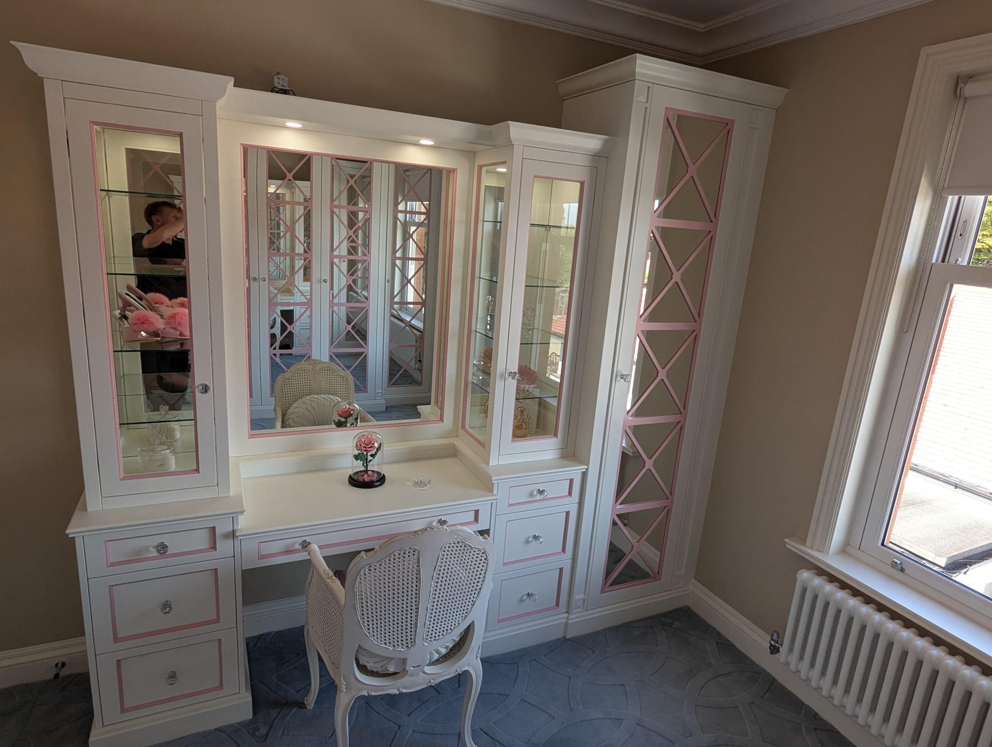 Luxury dressing room with vanity and display cabinets