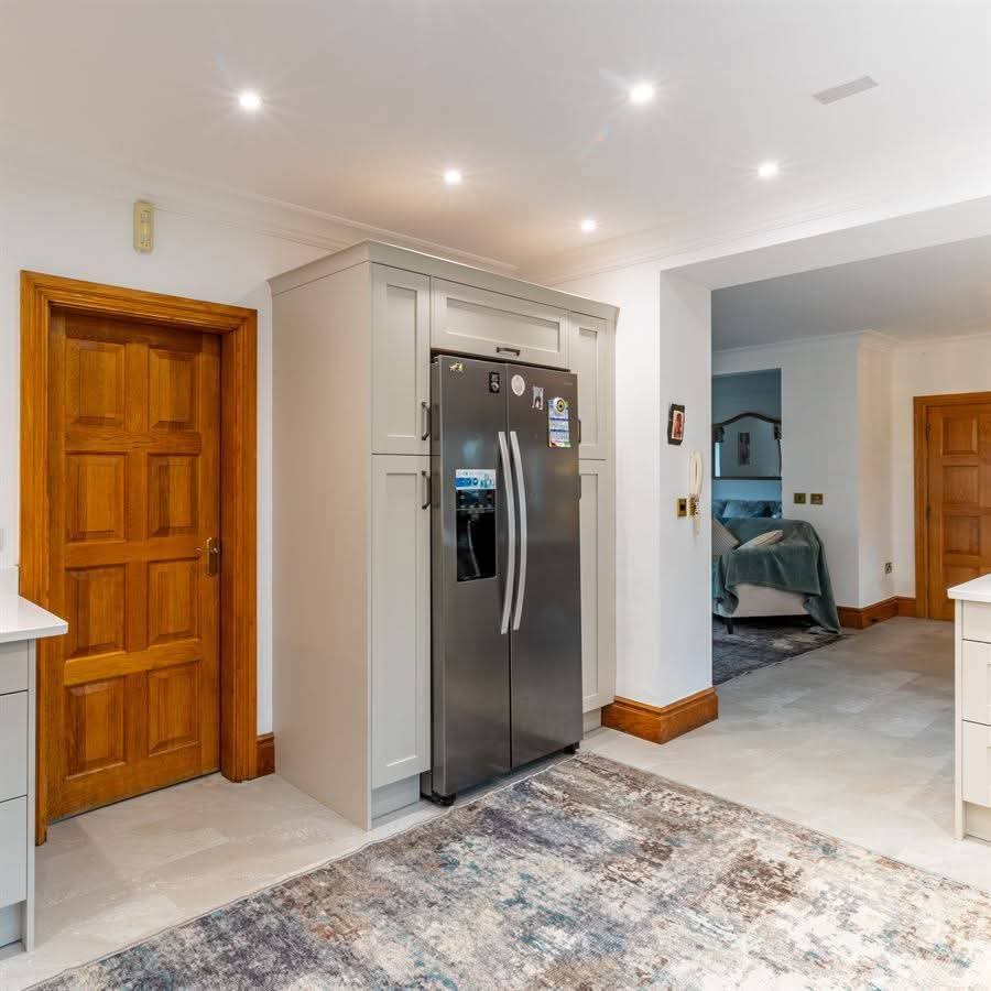American fridge freezer with bespoke fitted housing unit