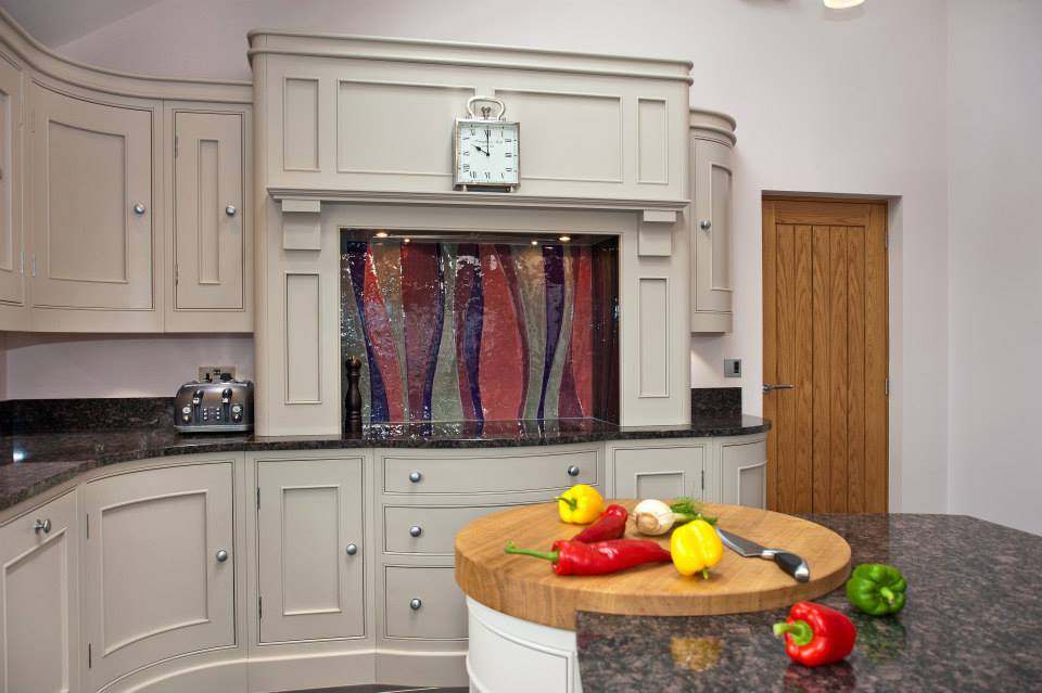 Custom kitchen with art glass splashback feature